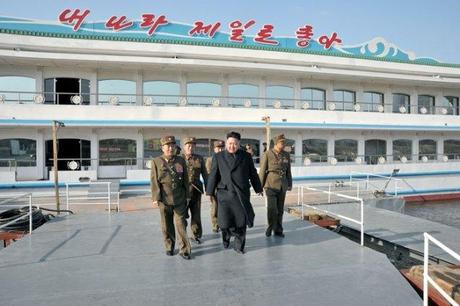 Kim Jong Un (2nd L) tours a Taedonggang restaurant boat on 24 March 2013.  Also seen in attendance is Gen. Kim Yong Chol (L) (Photo: Rodong Sinmun)