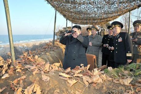 Kim Jong Un observes live fire joint exercises by DPRK ground, naval and artillery forces on the country's east coast on 25 March 2013 (Photo: Rodong Sinmun)
