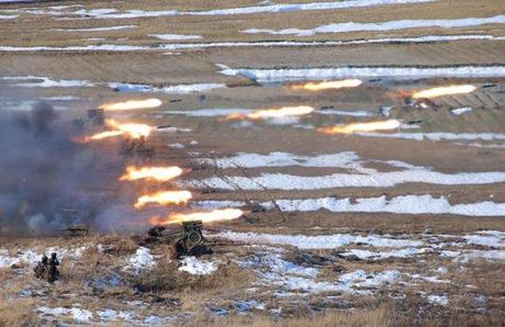 Women members of the 1st platoon of KPA Large Combined Unit 324 participate in artillery drills (Photo: Rodong Sinmun)
