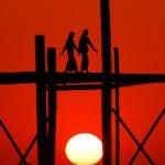 Walking sun over U Bein Bridge Myanmar Luminous Journeys