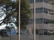 Activist Climbs Flagpole Outside LyondellBasell, Hangs Banner Denouncing Investment Sands