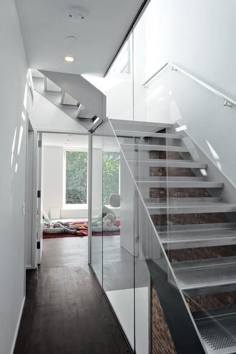 Custom stainless steel staircase with perforated steel treads