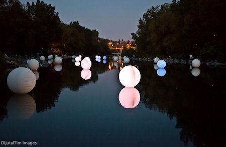 Rivers Aglow With Ethereal Globes Of Color