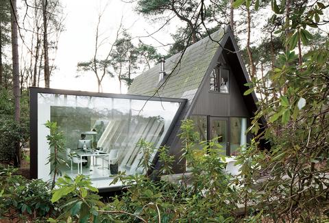 Modern glass extension in Belgium.