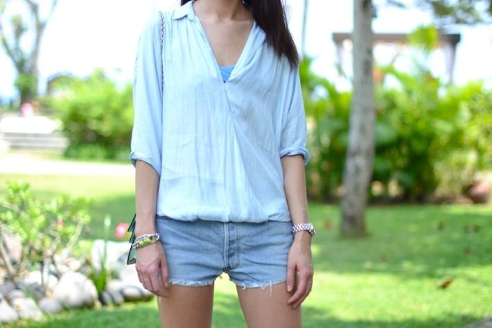 baby blue zara silk blouse tucked in