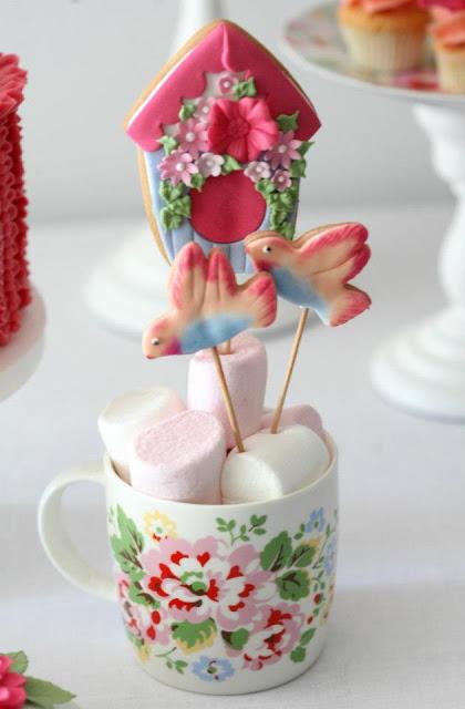 Spring Time Themed Table with beautiful birds and floral sweet treats by Cupcake