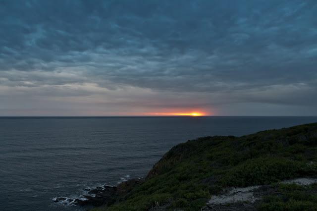 dark clouds above sunset at cape liptrap