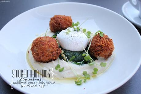 Smoked ham hock coquettes with cauliflower puree, baby spinach and a poached egg