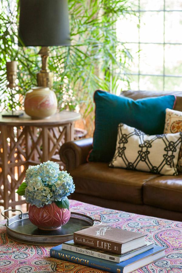 Design Manifest Living Room, fabric ottoman, leather sofa
