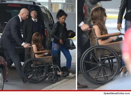 Lady Gaga in a Louis Vuitton Wheel chair recovering from a hip