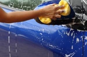 Outdoor Blue Car Wash With Yellow Sponge