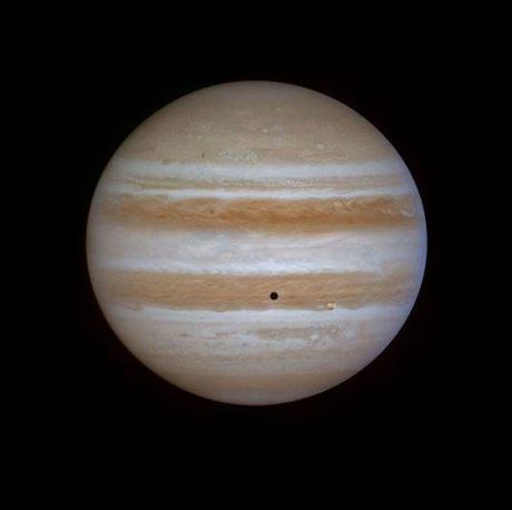 Io passes across face of Jupiter