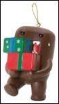 Domo Resin Ornament: Domo Carrying Gifts