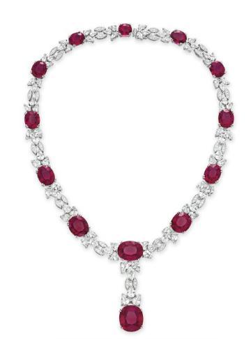A RUBELLITE TOURMALINE DIAMOND AND COLORLESS SAPPHIRE NECKLACE