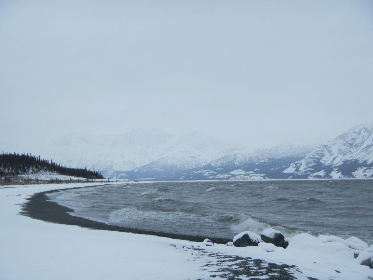 Dense fog and snow on the lake