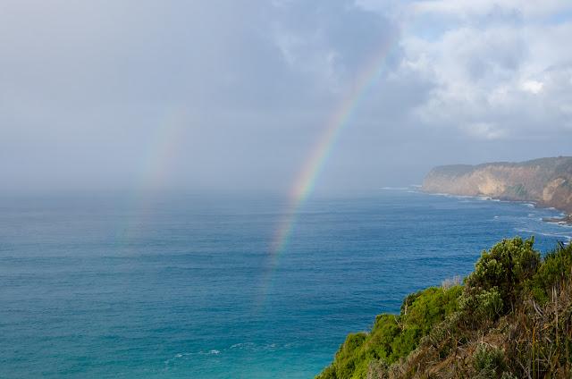 double rainbow over ocean