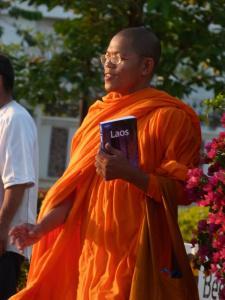 Buddhist monk with a Lonely Planet guide to Lao (taken in Vientiane)