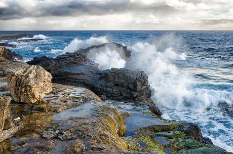 waves breaking on rocks 