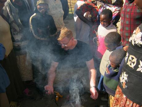 Jacobson demonstrates the VOTO charger in Kenya. (Kenya photos courtesy Jacobson)