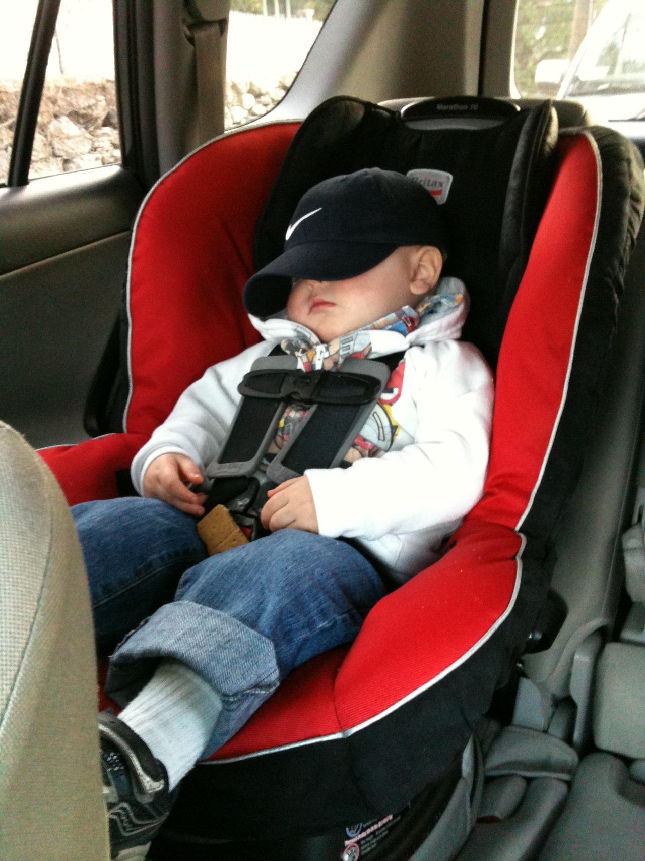 Someone was sleepy on the way to daycare this morning. He even abandoned the graham cracker to snooze under that cap!