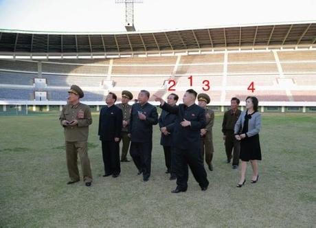 Kim Jong Un (1) provides instructions on the renovation of Yanggakdo Stadium in Pyongyang.  Also seen in attendance are Jang Song Taek (2), VMar Choe Ryong Hae (3) and Kim Jong Un's wife Ri Sol Ju (4) (Photo: Rodong Sinmun)
