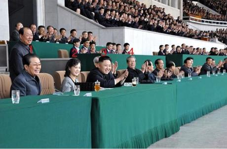 Kim Jong Un (3) attends the men's premier league football finals for the Mangyongdae Prize at Kim Il Sung Stadium in Pyongyang on 29 April 2013.  Also watching the game with are Jang Song Taek (1), Ri Sol Ju (2) and Choe Tae Bok) (Photo: Rodong Sinmun)