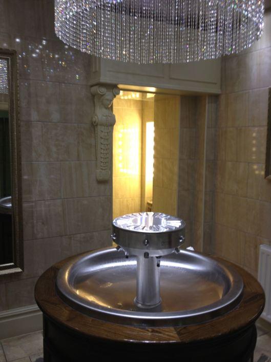 Sink and chandelier at Woodman Pub, Highgate, London