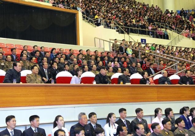 Kim Jong Un (1) watches a sports competition of public health workers on 1 May 2013 with his wife Ri Sol Ju (2).  Also in attendance are: Jang Song Taek (3), VMar Choe Ryong Hae (4), Pak Pong Ju (5), Kim Kyong Hui (6), Kim Ki Nam (7) and Kim Yang Gon (8).  (Photo: Rodong Sinmun) 