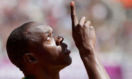 Athlete pointing to the sky gets track team disqualified