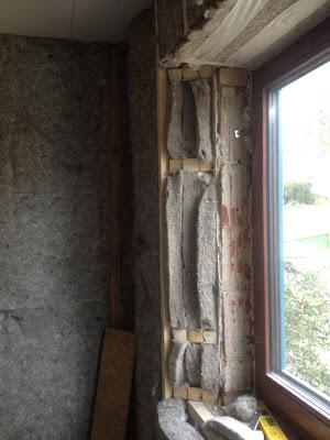 3 layers of insulation by window reveal, small section of wall that can't be insulated as to do so would prevent window from opening