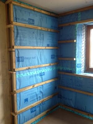 Airtightness/Vapour control layer complete around the internal insulation.  Battens to hold plasterboard and create void through which electric cables can be fitted.