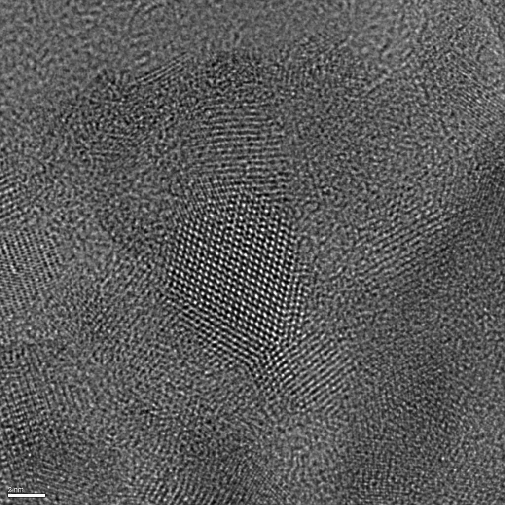 This transmission electron microscope image shows a single nanocrystal of the semiconductor CZTS dissolved in an organic solvent. The nanocrystal is faintly visible in the center of the photo, shaped like a table-tennis paddle. The CZTS was produced by University of Utah researchers using an old microwave oven. University of Oregon researchers made the image for their Utah colleagues. (Credit: Center for Advanced Materials and Characterization of Oregon)