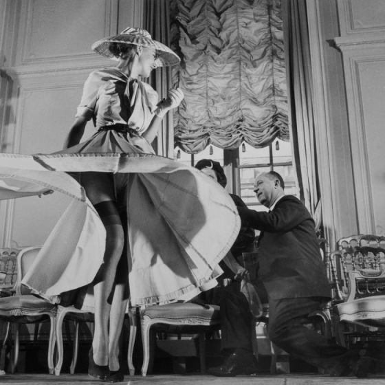 Christian Dior with Woman Modeling Dress 