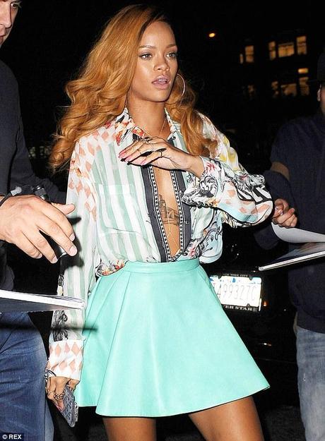 Rihanna out and about in NYC wearing Balmain and Manaolo...