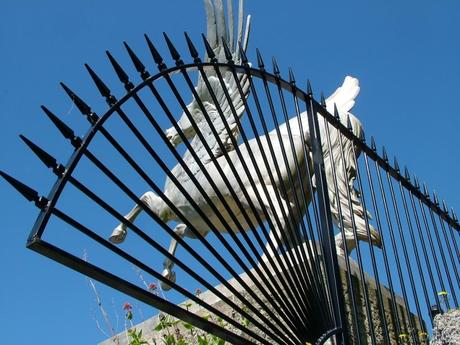 Winged Horse statue through fence - Powerscourt - Ireland