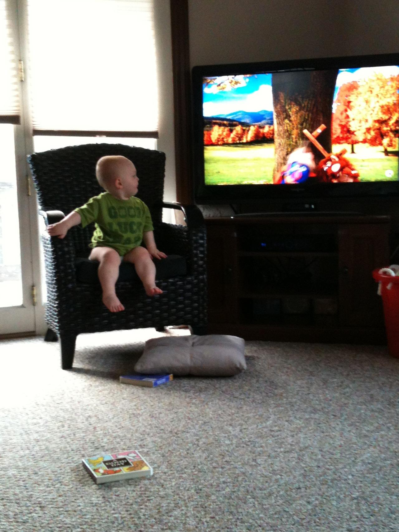 Someone climbed up onto this chair all by himself (a first!) - I’m sure proximity to the TV was a motivationg factor.