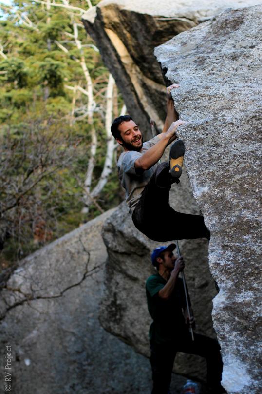 Dolan cruises a lip traverse while Max scrubs the upcoming holds. That's what family's for.