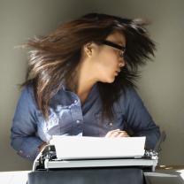 Woman with typewriter.