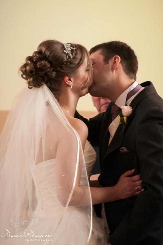 Leeds Wedding Photography at Moortown Baptist Church of the first kiss