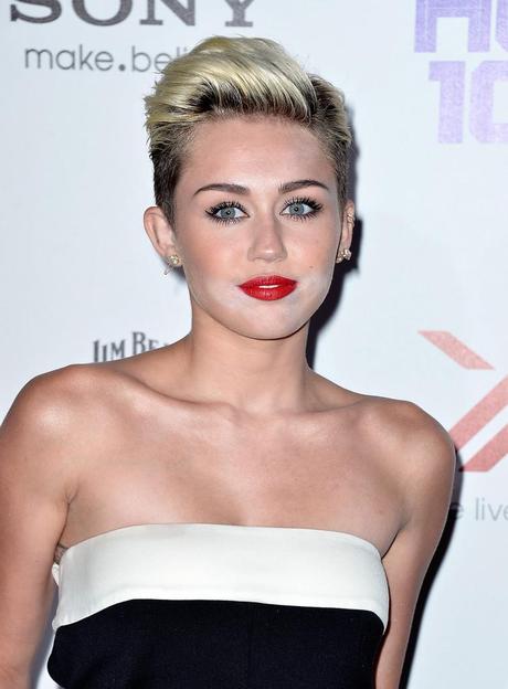 Miley Cyrus in Saint Laurent and Valentino at the 2013 Maxim Hot...