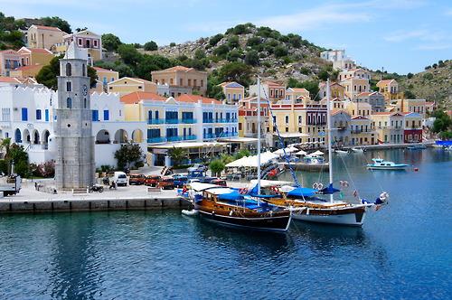 The North Coast of Rhodes and the neo-classical harbor of Symi,...