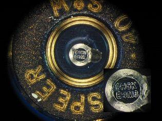 An example of a microstamp on a bullet case.