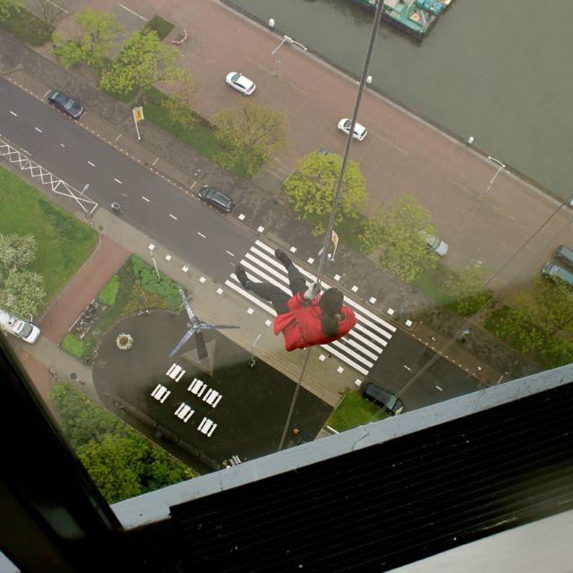 More than halfway down while abseiling from the Euromast.