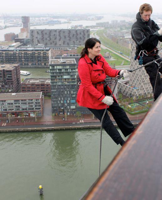 Hesitating before taking the final step into thin air to start the abseil.