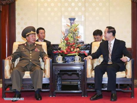 Wang Jiarui (R), vice-chairman of the National Committee of the Chinese People's Political Consultative Conference and head of the International Department of the Communist Party of China Central Committee, meets with Choe Ryong Hae, special envoy of the Democratic People's Republic of Korea (DPRK) top leader Kim Jong Un, and a member of the Presidium of the Political Bureau of the Central Committee of the Workers' Party of Korea, in Beijing, capital of China, May 22, 2013. (Xinhua/Ding Lin)