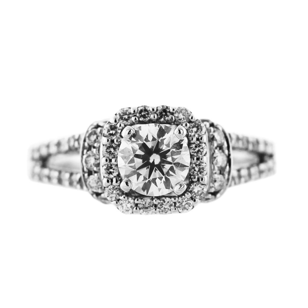 White gold and diamond engagement ring in square halo with round diamond