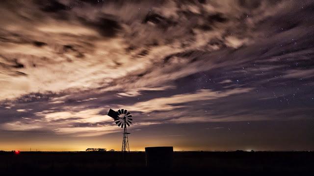 windmill at night moving clouds