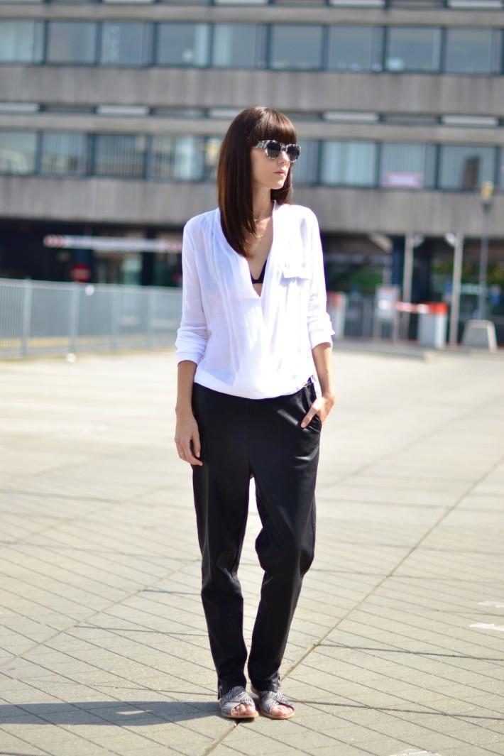 outfit baggy leather trousers white wrap blouse