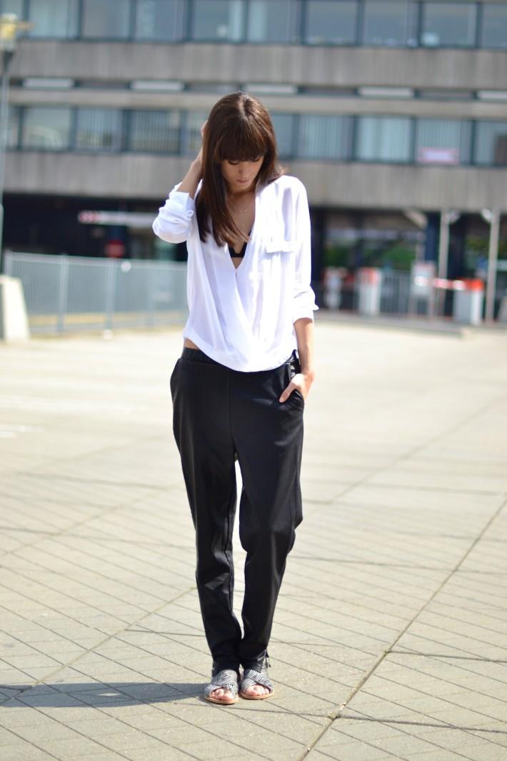 outfit baggy leather trousers white drape blouse