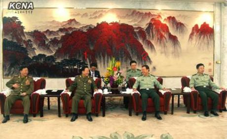 VMar Choe Ryong Hae (1), a special envoy of DPRK leader Kim Jong Un, talks with Gen. Fan Changlong (2), Vice Chairman of the CPC Central Military Commission during a meeting in Beijing on 24 May 2013 (Photo: KCNA)
